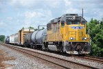 Local cruises east down the siding waiting for a meet